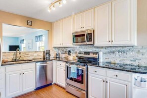 Fridge, microwave, oven, stovetop - Bethany Bay Third-Floor Dog-Friendly Condo w/Free WiFi, Balcony, & Shared Pool (Ocean View)