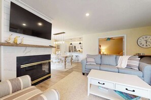 TV, fireplace, DVD player, offices - Sea Colony ground floor condo, updated with fast WiFi, gas fireplace, & deck (Bethany Beach)