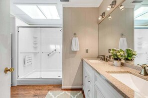 Shower, towels - Mallard Lakes townhouse with hot tub, pool, water views, & fireplace (Selbyville)