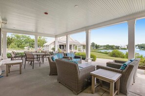 Outdoor dining - Millville By The Sea home w/3 pools, pickleball, fitness center, fireplace, dock (Millville)