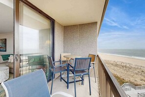 Outdoor dining - Sea Colony beachfront condo with twelve pools, two hot tubs, & balcony views (Bethany Beach)