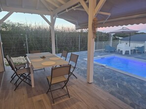 Outdoor dining - 3 bedroom house with pool, sea view (Le Moule)