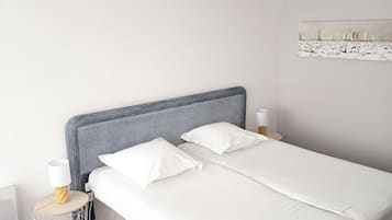 Economy Twin Room, Non Smoking, Balcony | In-room safe, iron/ironing board, free cots/infant beds, travel cot