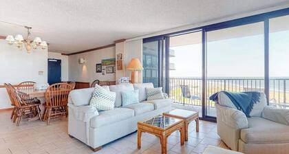 Sea Colony corner condo with ocean views, wraparound balcony, pools, & beach