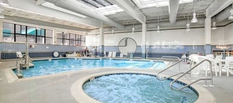 Sea Colony villa with deck, AC, multiple pools, hot tubs, gym, & sports courts