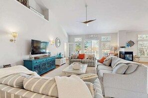 TV, fireplace, offices - Bear Trap Dunes dog-friendly retreat with serene water views (Ocean View)