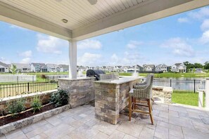 Outdoor dining - Marlin Chase home with resort amenities, patio, grill, balcony & pool (Ocean View)