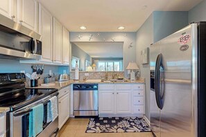 Fridge, microwave, oven, stovetop - Bethany Bay spacious condo w/shared pool, water view & golf course (Ocean View)