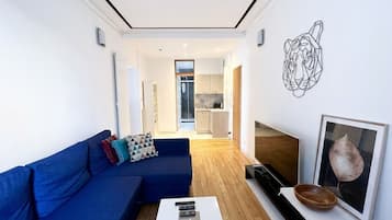 Departamento Confort, vista a la ciudad | Área de sala de estar