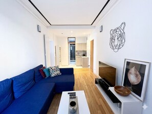 Departamento Confort, vista a la ciudad | Área de sala de estar