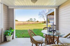 Outdoor dining - Bayville Shores - Inviting townhome with pool, fitness area, tennis, & W/D (Selbyville)