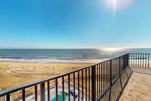 A balcony with a view of the beach and ocean. - Sea Colony Oceanfront Penthouse - Views, Wrap-Around Deck, Pools, Private Beach (Bethany Beach)