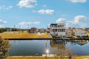 Exterior - Spacious pet friendly waterfront house w/deck, patio, balcony & gas grill (Bethany Beach)