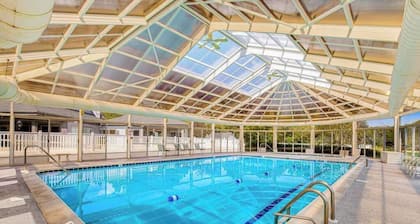 Salt Pond home with on-site golf, indoor/outdoor pools, gym, & sports courts