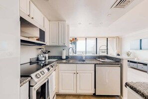 Fridge, microwave, oven, stovetop - Enjoy views, resort amenities & a spacious condo for perfect beach retreat (Bethany Beach)