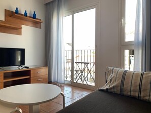 TV - Apartment '1A for 2-4 guests' with shared pool, Wi-Fi and air conditioning (Nerja)