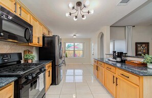 House, Multiple Beds, Patio, Garden View (Crescent 7211) | Private kitchen - 4BR Game Room + Firepit Sleeps 9 Near Eats (Houston)