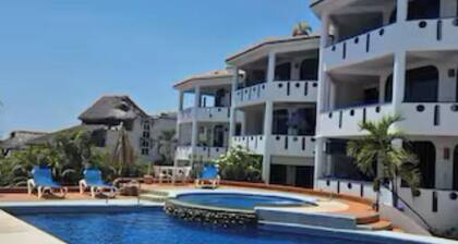 Beautiful condo #19 with 2 pools, one by the sea