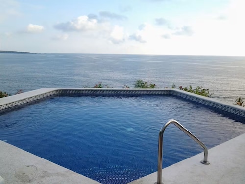 Beautiful condo #19 with 2 pools, one by the sea