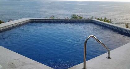 Beautiful condo #19 with 2 pools, one by the sea