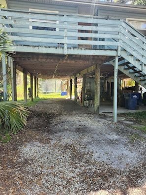 Property grounds - Lovely 2-bedroom stilt house with AC in charming Crystal Beach. (Palm Harbor)