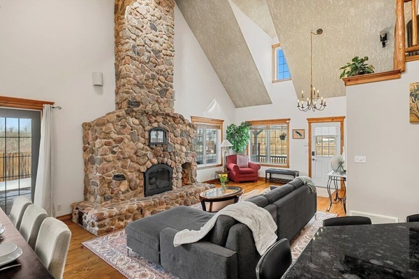 Comfortable living area with cozy seating and fireplace views