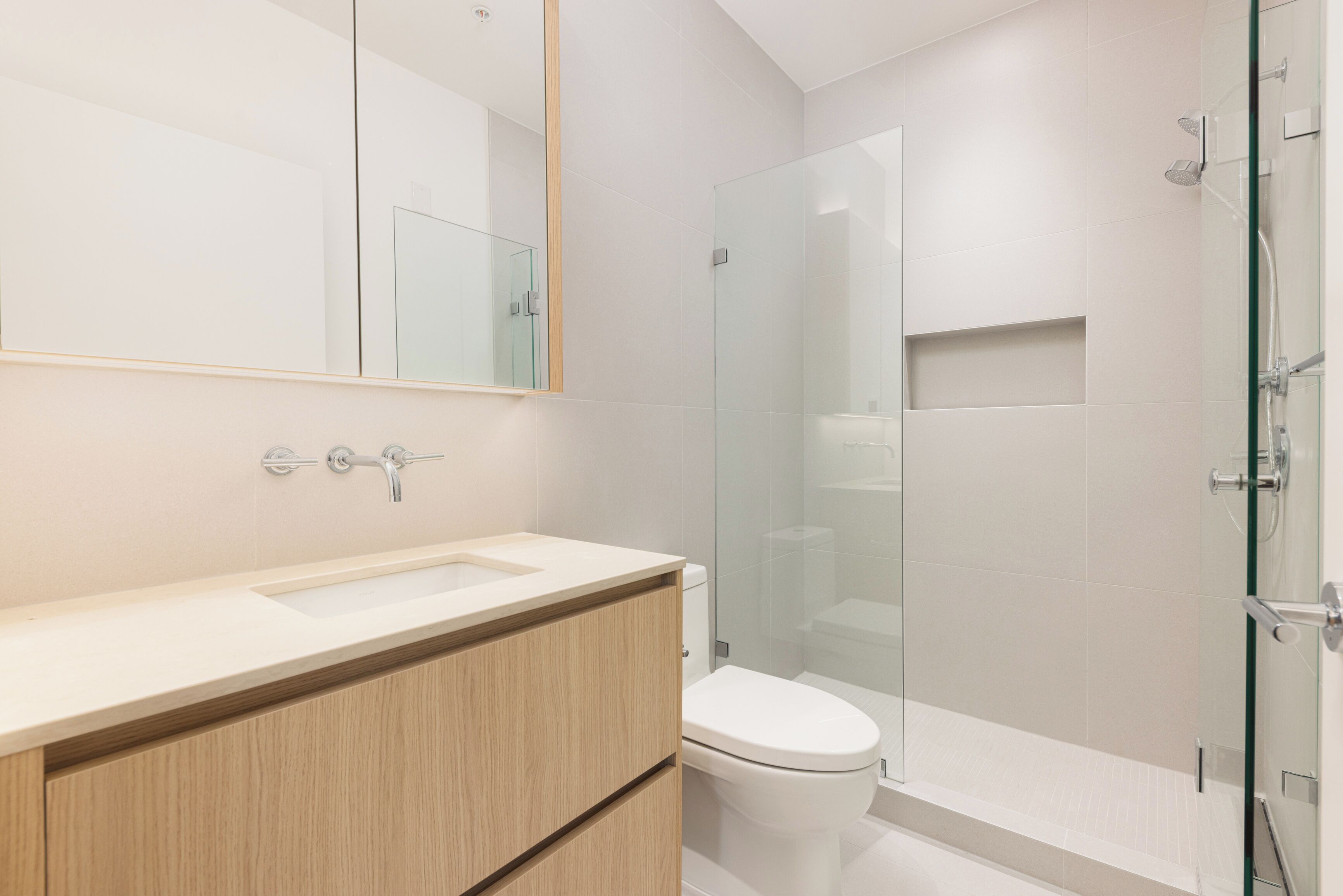 Shower, hair dryer, soap, toilet paper