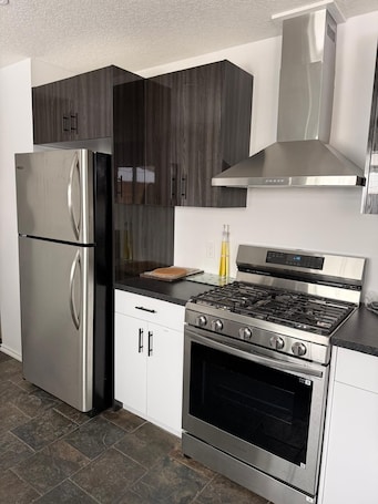 Microwave, oven, stovetop, dishwasher. Convenient Location Near Large Shopping Mall and Train Station.