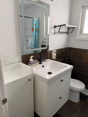 Hair dryer, towels, soap, toilet paper - Convenient Location Near Large Shopping Mall and Train Station. (Calgary)