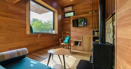5 minutes from the beach and in the heart of a green setting. timber-framed house