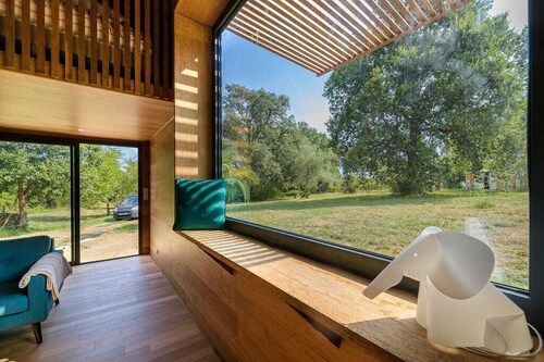 5 minutes from the beach and in the heart of a green setting. timber-framed house