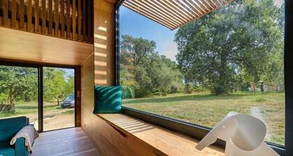 5 minutes from the beach and in the heart of a green setting. timber-framed house