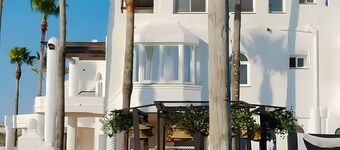 Isla Verde 2: Seaside Retreat Amid Green Surroundings