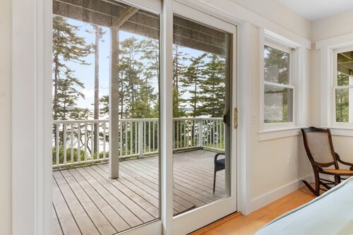 Comfortable bayfront home with beautiful views, large deck & on-site tennis
