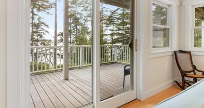 Comfortable bayfront home with beautiful views, large deck & on-site tennis