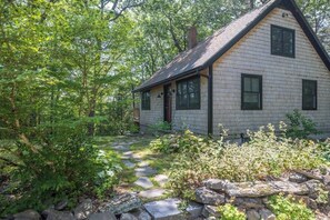 Exterior - Renovated woodland home with lovely deck & firepit - minutes to Swan Lake (Swanville)