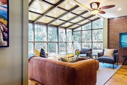 Elegant Victorian Gothic Revival home with wet bar, sunroom, & washer/dryer