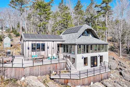 Oceanfront home on 6 acres with multi-level deck & spectacular view