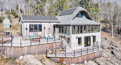 Oceanfront home on 6 acres with multi-level deck & spectacular view