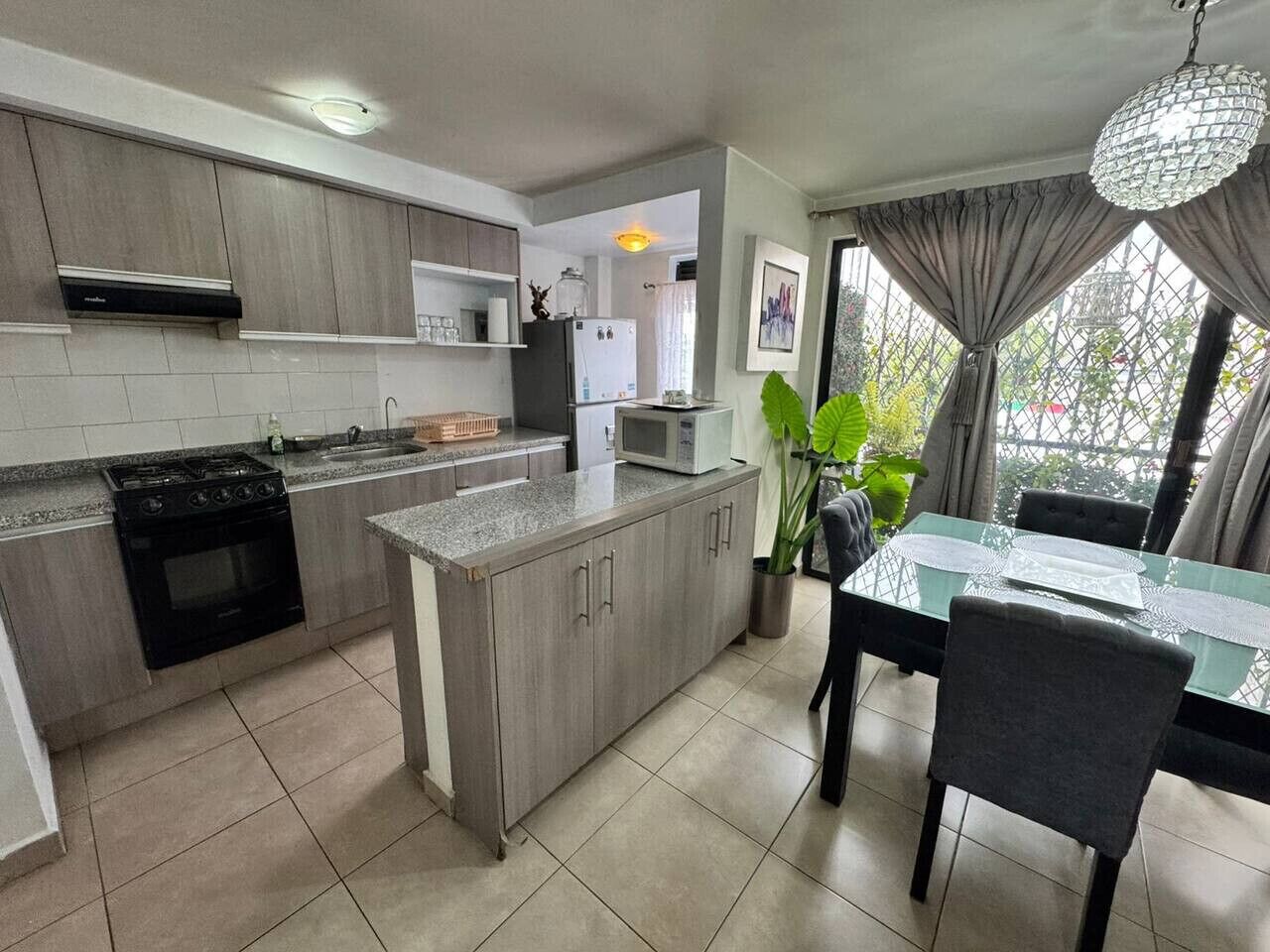 Fridge, microwave, stovetop, cookware/dishes/utensils