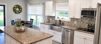 Spacious 5-bed 3 bath house in beautiful Nauvoo with 1 acre fully stocked pond