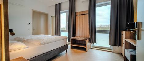 Design Studio | In-room safe, individually decorated, individually furnished, desk