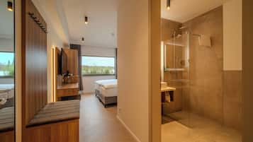 Kamar Double atau Twin Comfort | Kamar mandi | Shower, pengering rambut, handuk, dan sabun