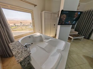 Romantic Suite, 1 Queen Bed, Balcony, Mountain View | Bathroom | Separate bathtub and shower, towels, soap, toilet paper - Avrio Skypool (Red Sea Governorate)