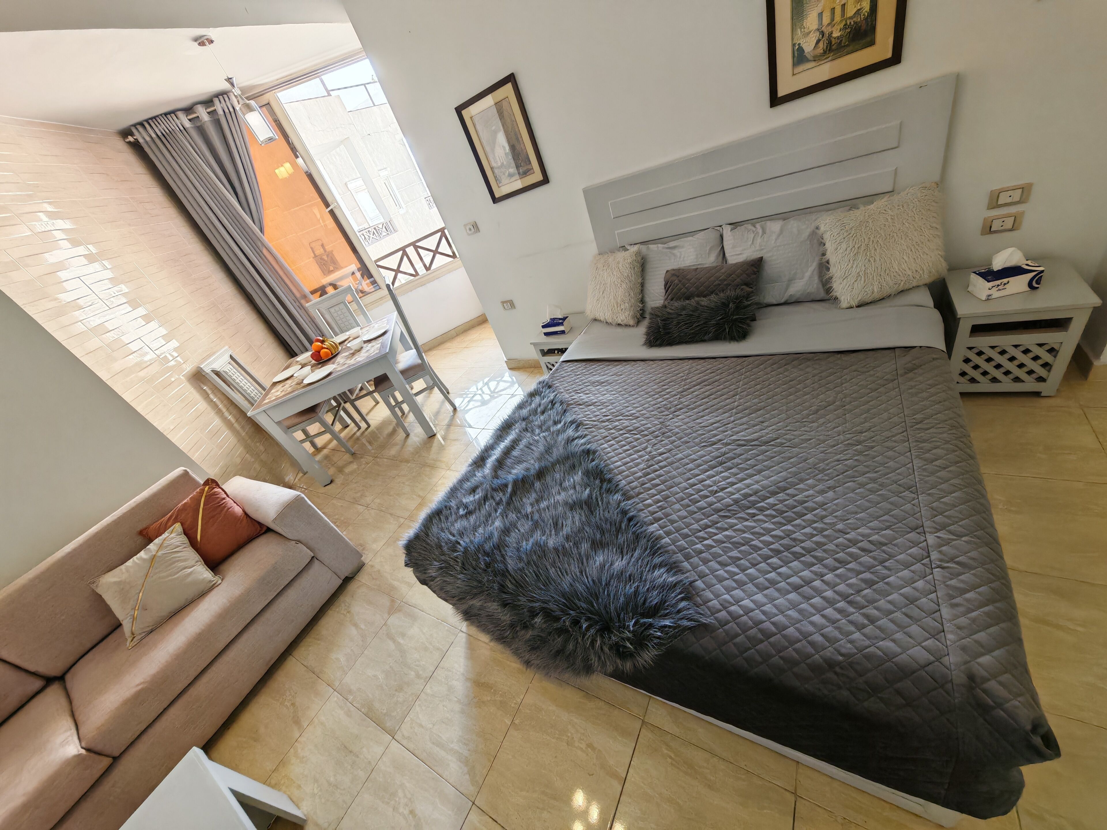 Luxury Studio, 1 Queen Bed, Kitchenette, Garden View | Desk, laptop workspace, iron/ironing board, free WiFi