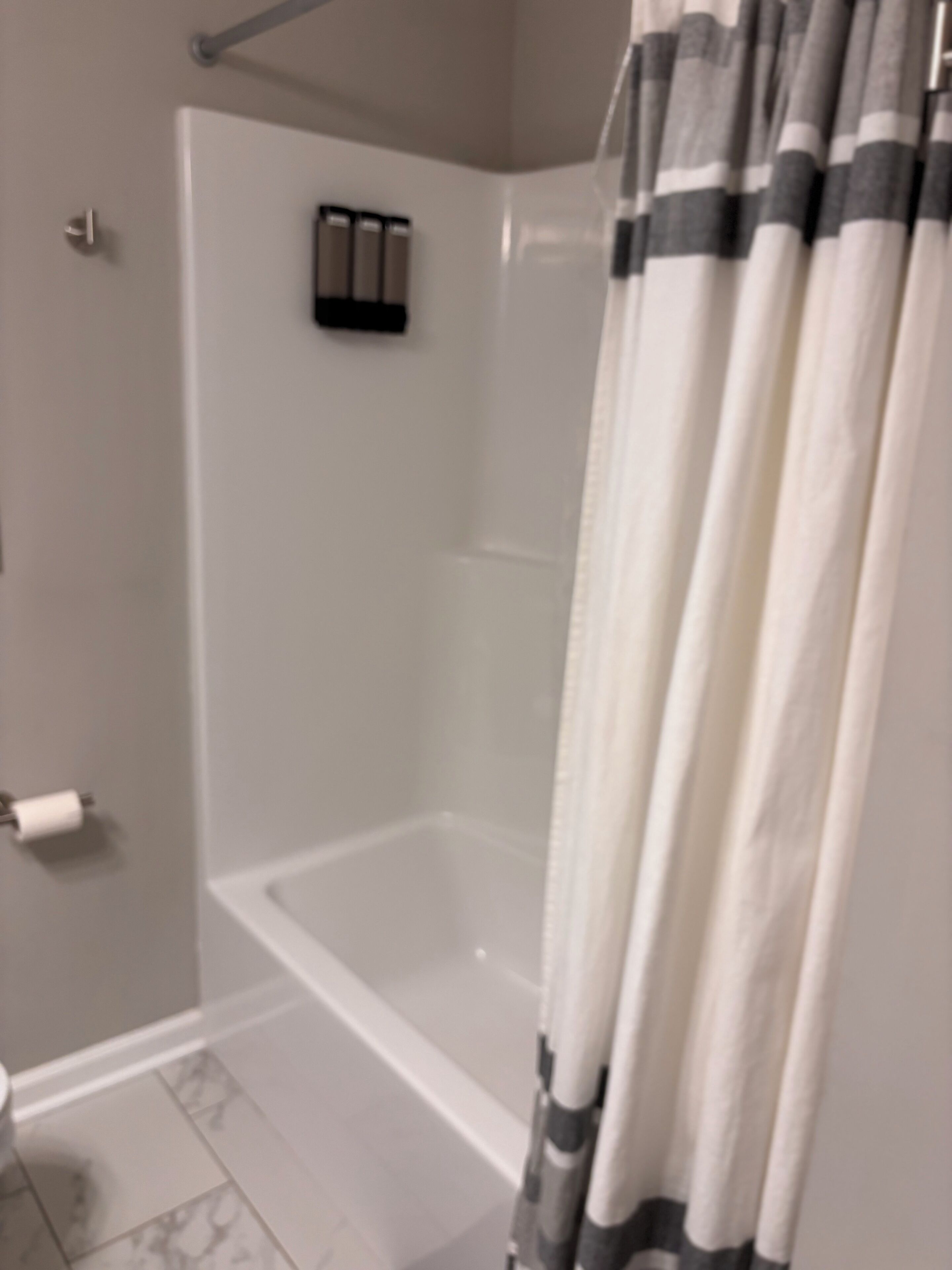 Hair dryer, towels, soap, shampoo