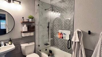 Shower, hair dryer, towels, soap