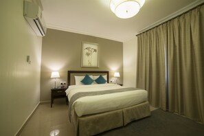 Room - Taskeen Served Apartment (Dammam)