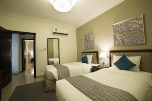 Room - Taskeen Served Apartment (Dammam)