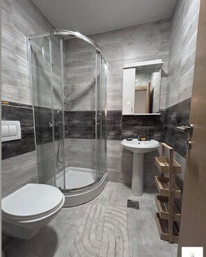 Shower, hair dryer, towels, soap - The Blue Sky Apartment is a spacious, cosy retreat perfect for families. (Budva)